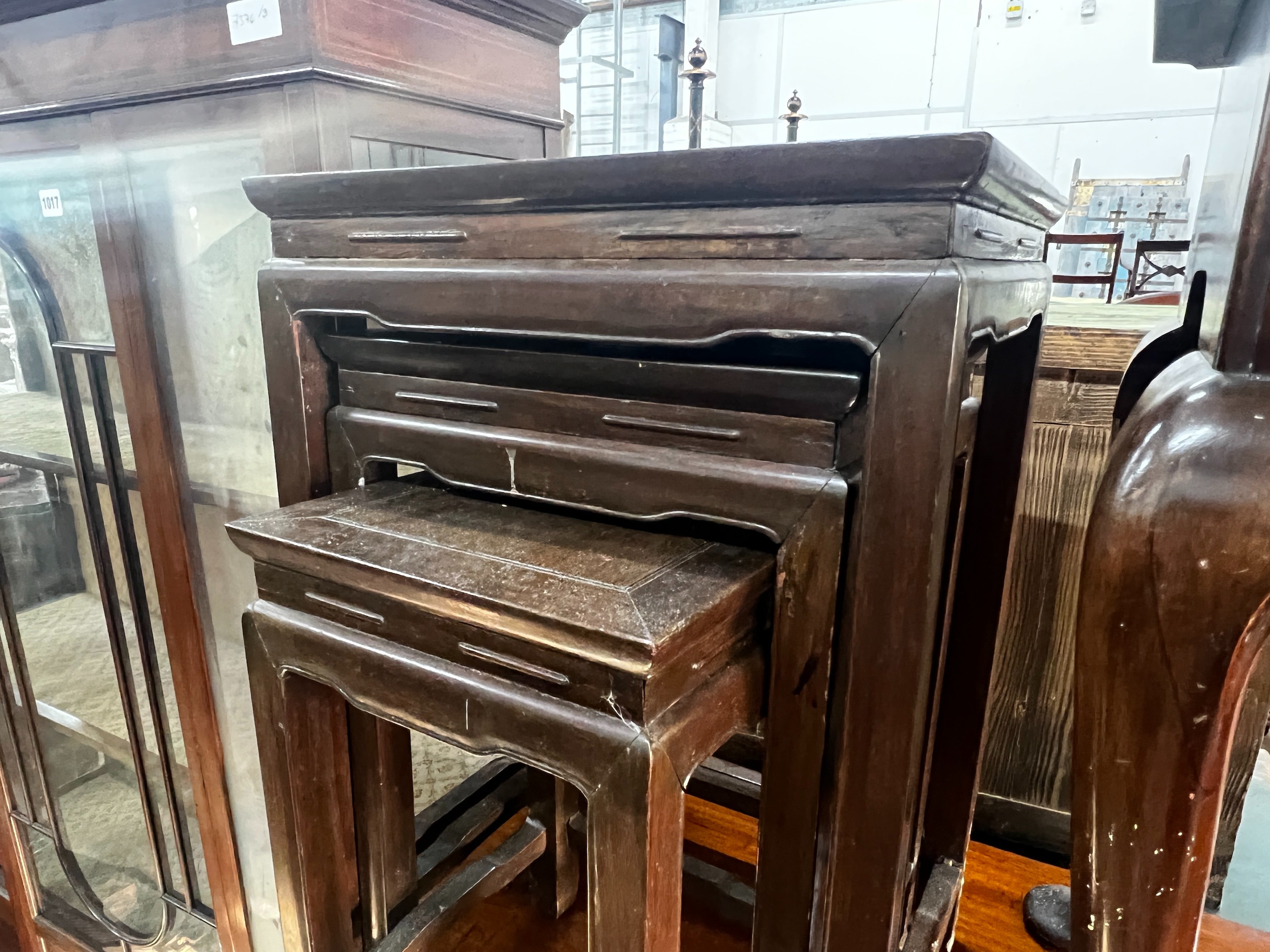 A nest of three Chinese hardwood tables, width 41cm, depth 32cm, height 59cm